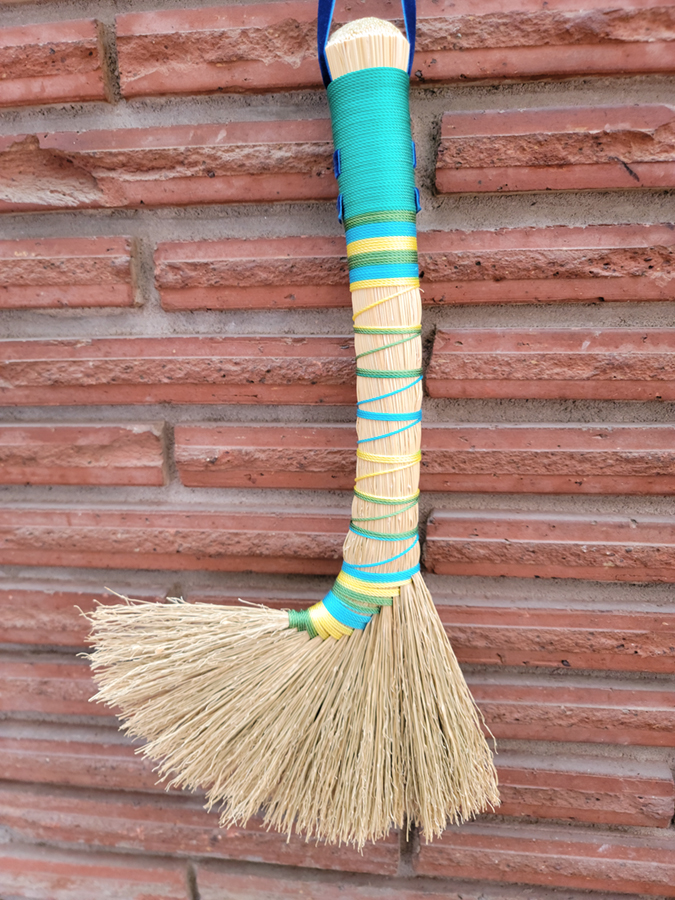 Stepped turkey hand broom in bright, spring theme