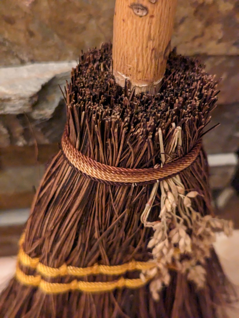 Natural palmyra fibers tied with brown and yellow cording