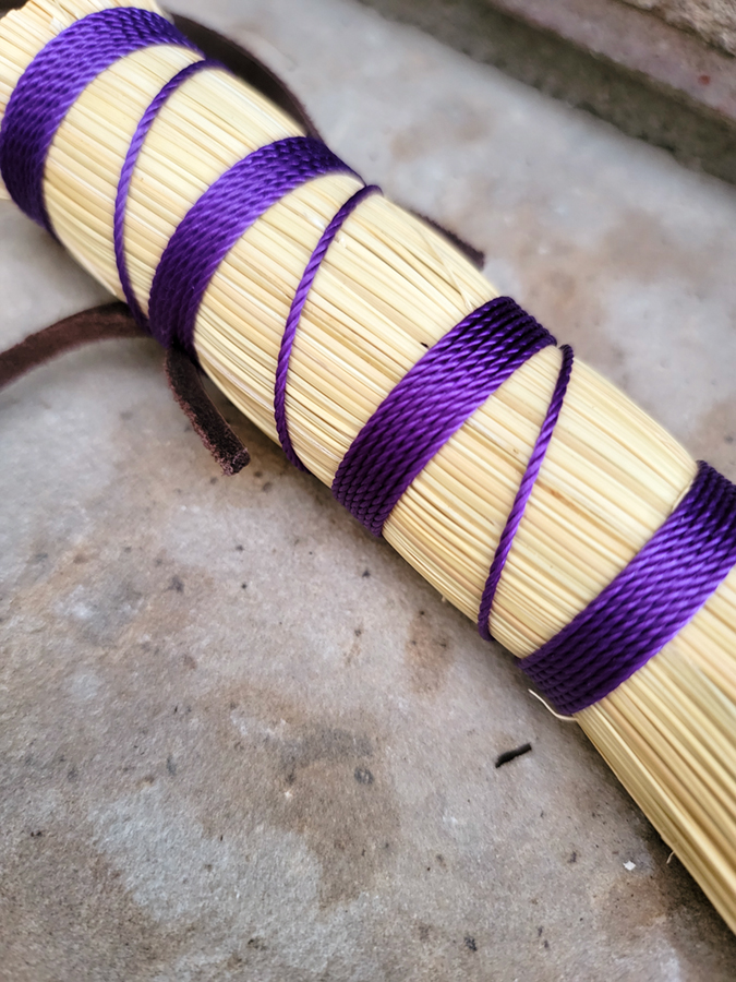 Detail of purple weave on handle