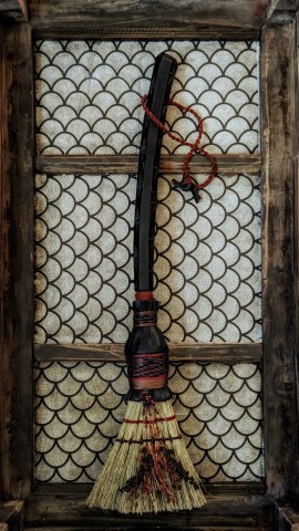 Hearth broom by Sorghum & Leather and Ulver Crafts - black carved handle and leather plaiting