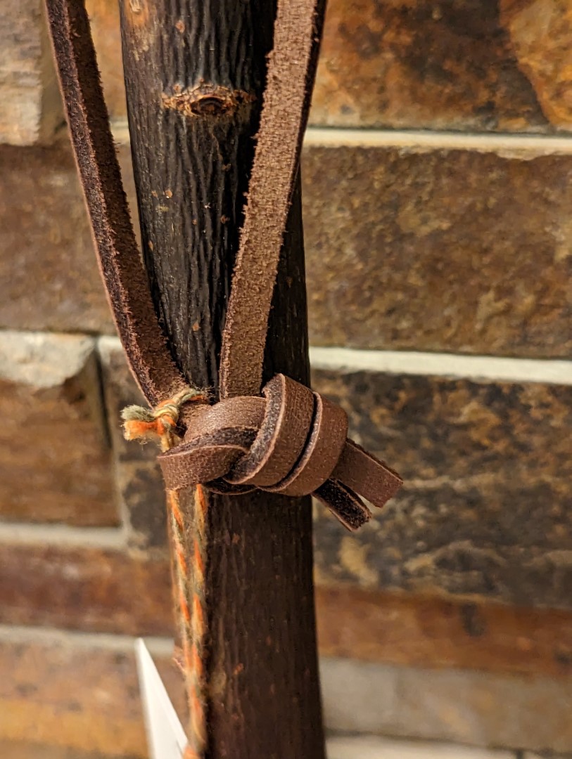 Detail of leather hangtag and bark